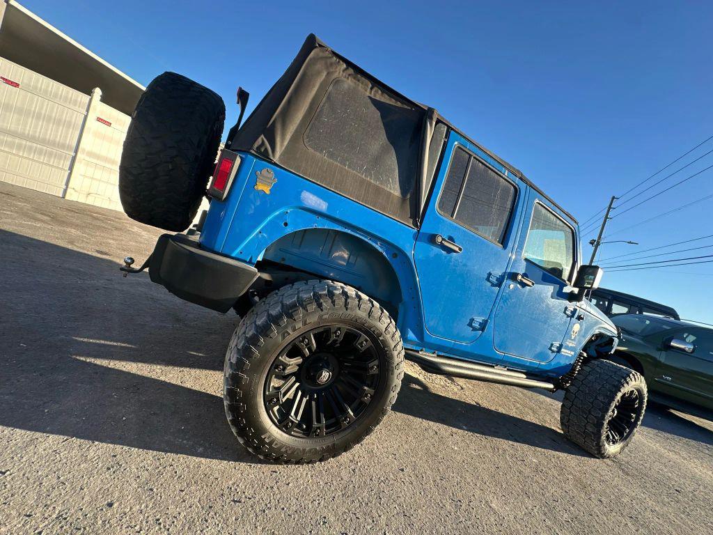 used 2011 Jeep Wrangler Unlimited car, priced at $14,995