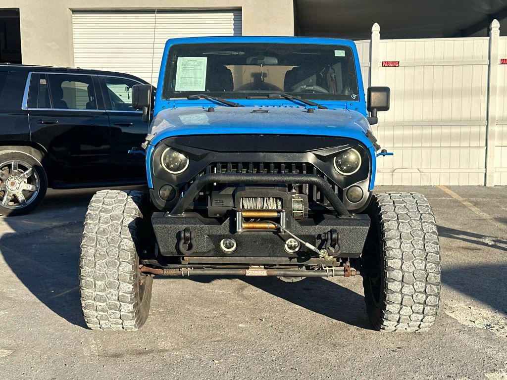 used 2011 Jeep Wrangler Unlimited car, priced at $14,995