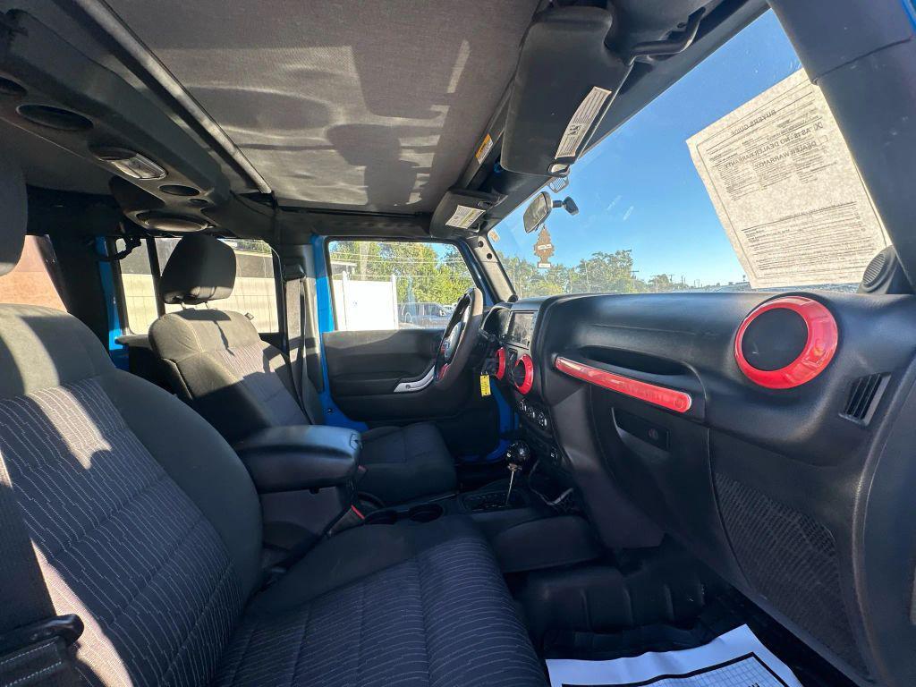 used 2011 Jeep Wrangler Unlimited car, priced at $14,995