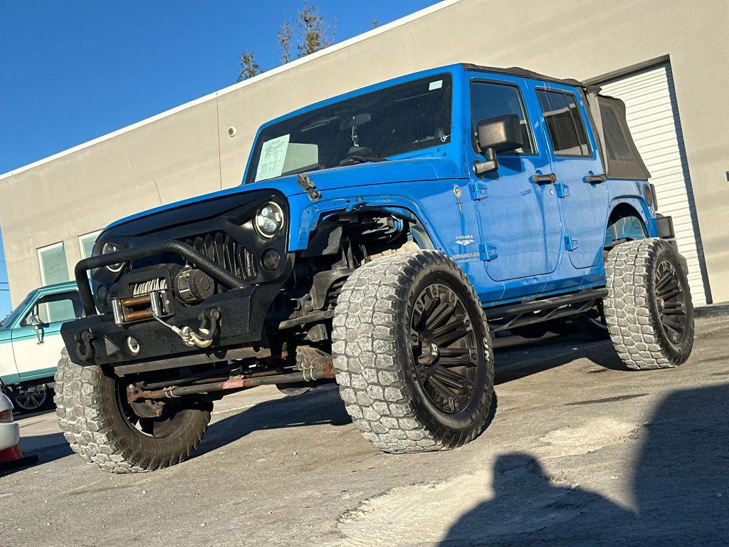 used 2011 Jeep Wrangler Unlimited car, priced at $14,995
