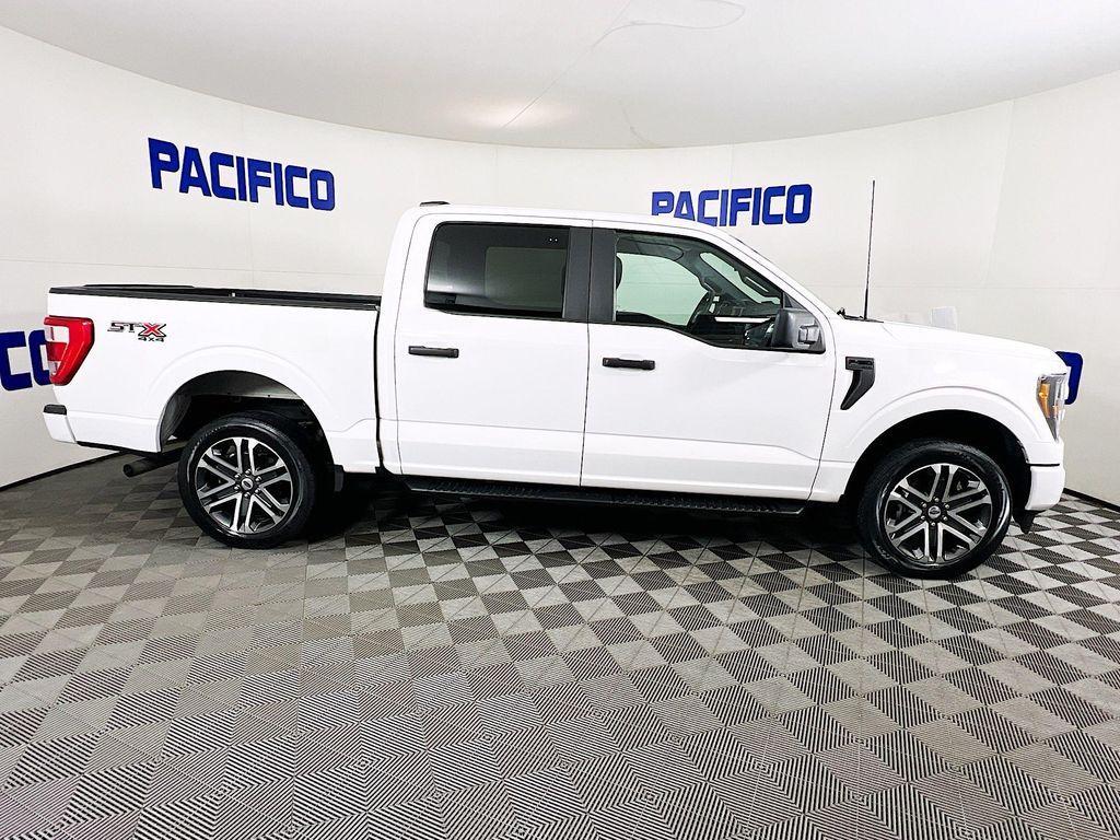 used 2023 Ford F-150 car, priced at $33,899