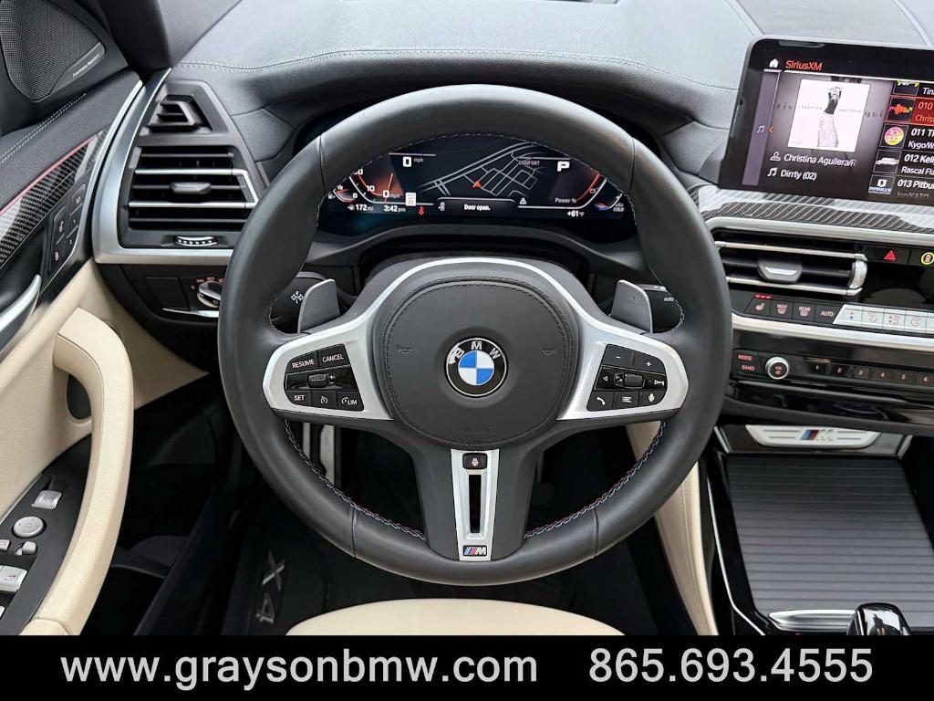 used 2025 BMW X4 car, priced at $59,299