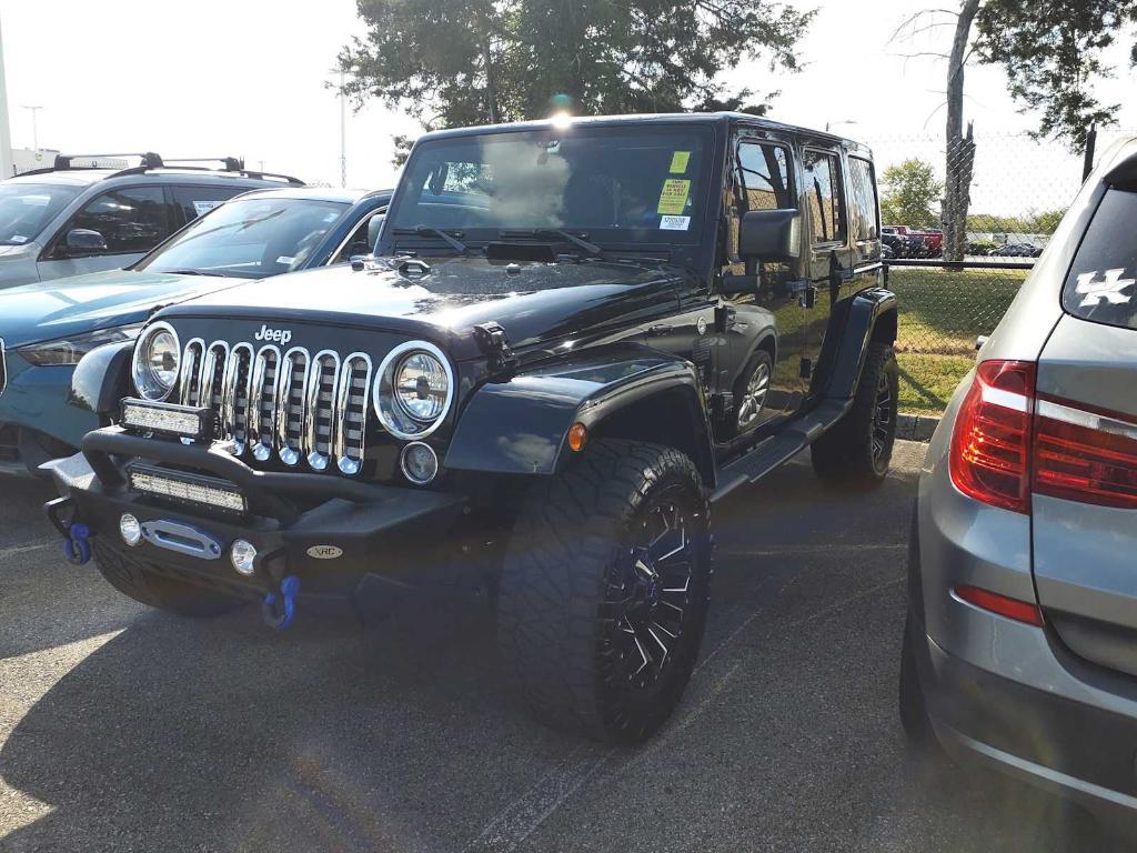 used 2015 Jeep Wrangler Unlimited car, priced at $18,334