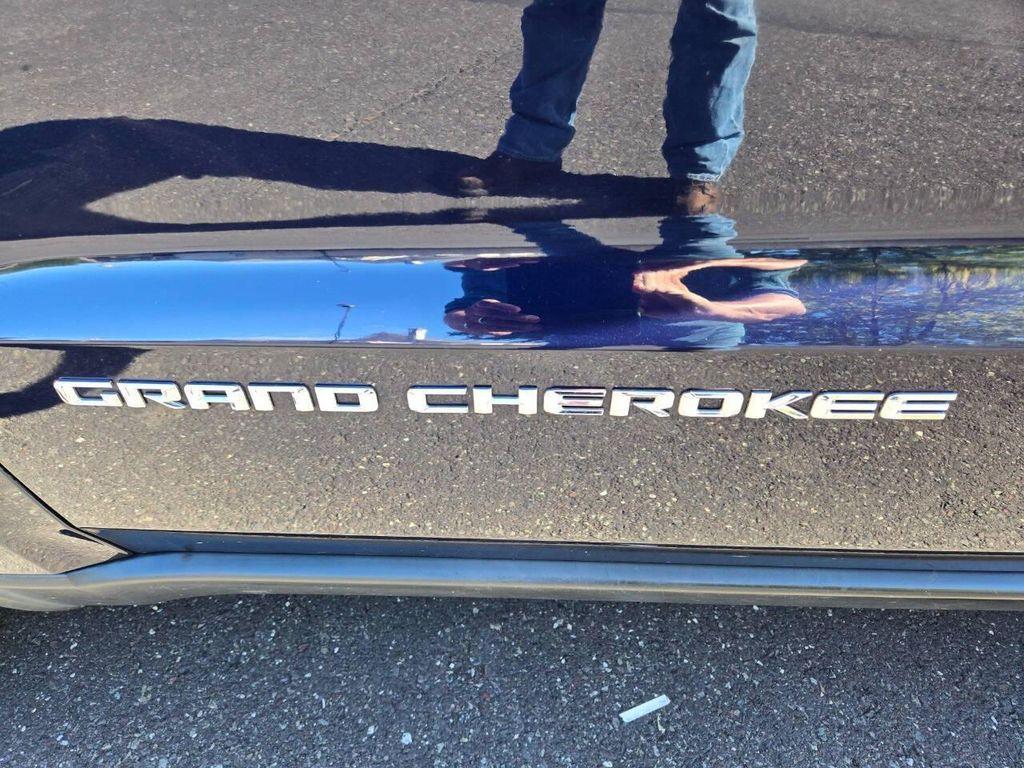 used 2014 Jeep Grand Cherokee car, priced at $9,998