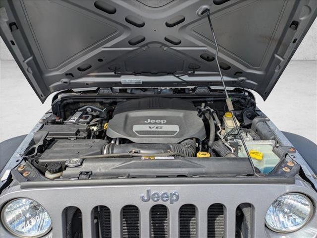 used 2015 Jeep Wrangler Unlimited car, priced at $16,185