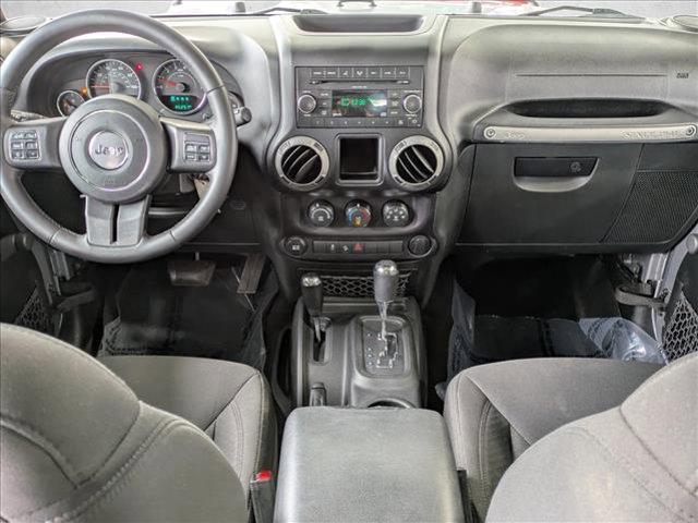 used 2015 Jeep Wrangler Unlimited car, priced at $16,185