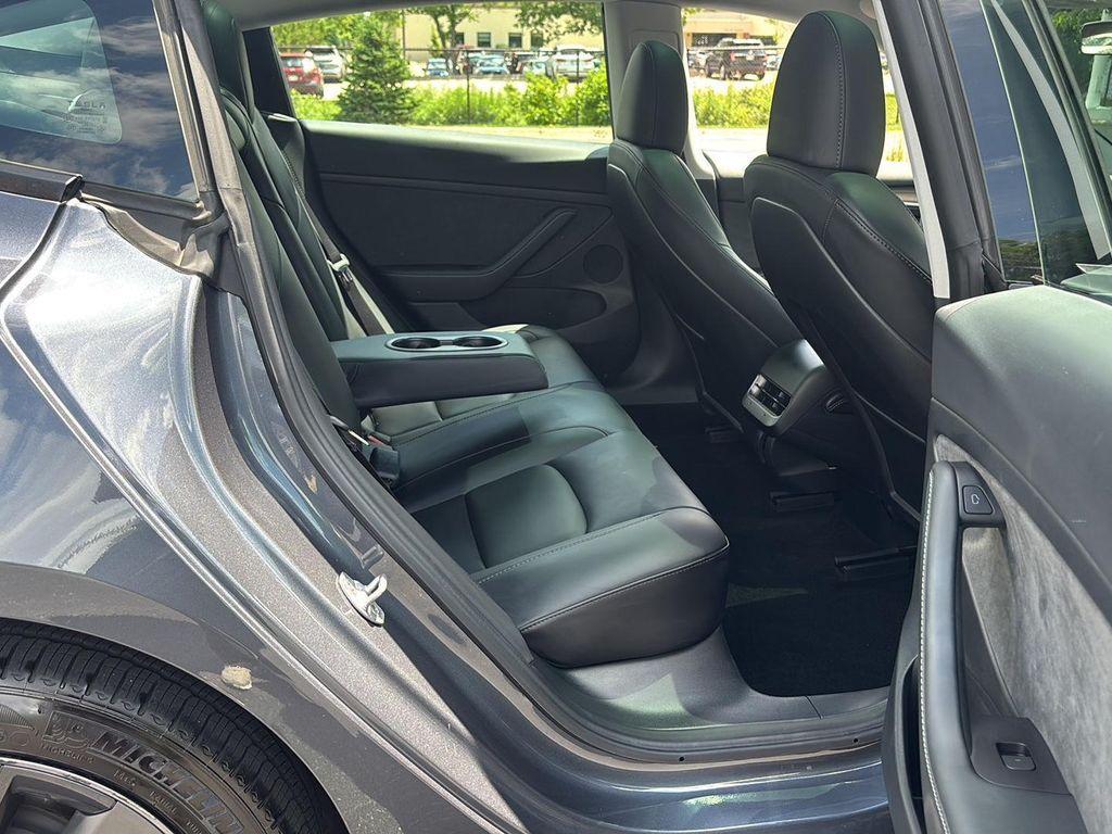 used 2023 Tesla Model 3 car, priced at $25,994