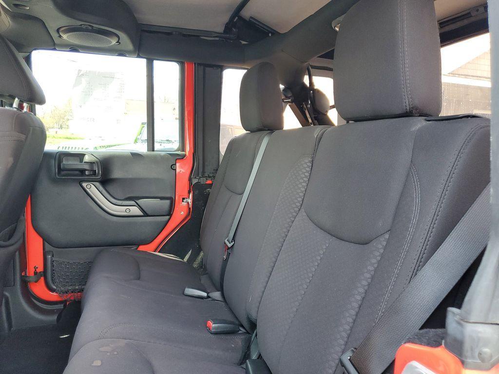 used 2013 Jeep Wrangler Unlimited car, priced at $12,999