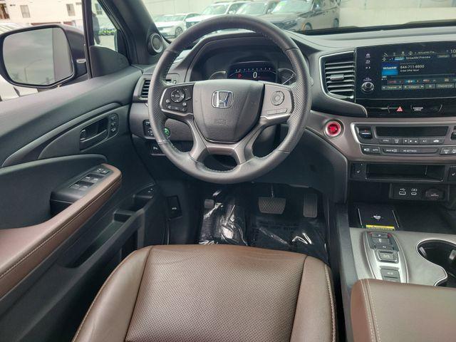 used 2024 Honda Passport car, priced at $31,401