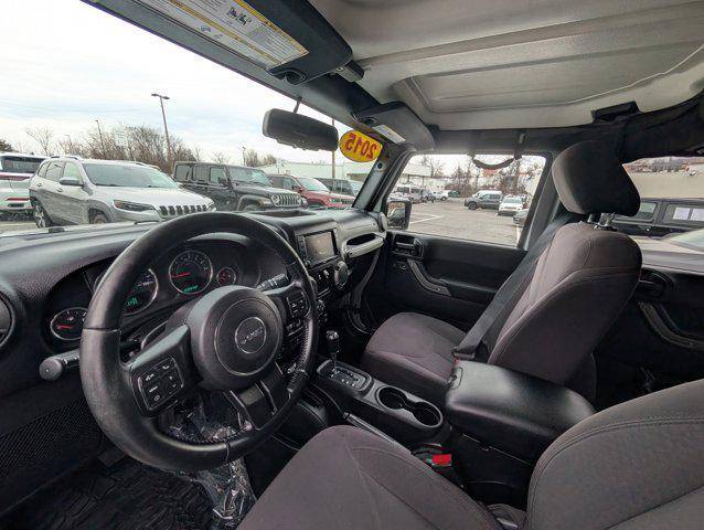 used 2015 Jeep Wrangler Unlimited car, priced at $13,724