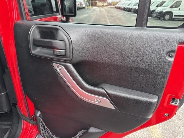 used 2013 Jeep Wrangler Unlimited car, priced at $15,558