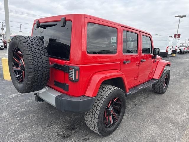 used 2013 Jeep Wrangler Unlimited car, priced at $15,558