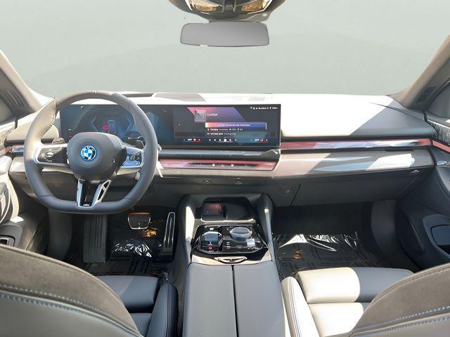 new 2026 BMW 550e car, priced at $84,610