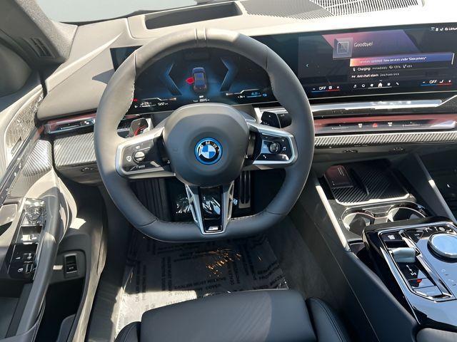 new 2026 BMW 550e car, priced at $84,610