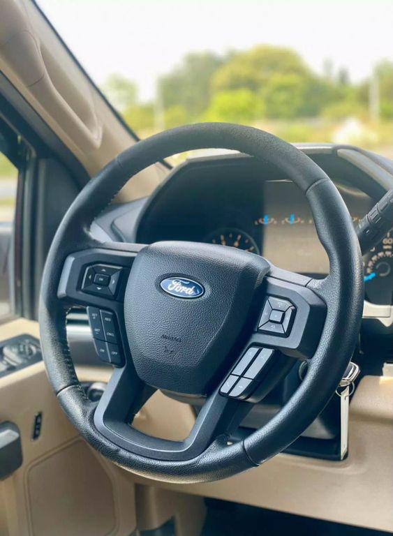 used 2015 Ford F-150 car, priced at $16,700