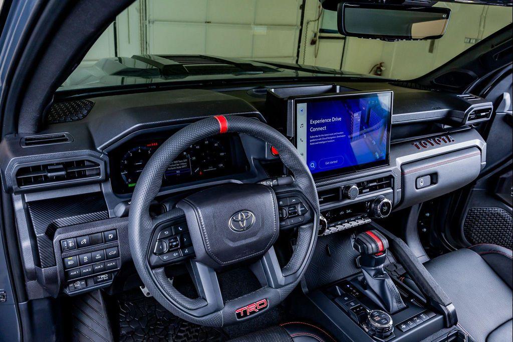 used 2025 Toyota Tacoma Hybrid car, priced at $73,141