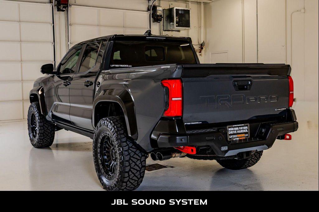 used 2025 Toyota Tacoma Hybrid car, priced at $73,141