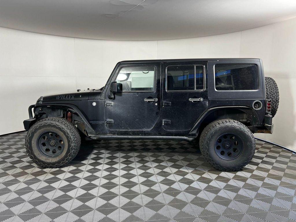 used 2016 Jeep Wrangler Unlimited car, priced at $14,202