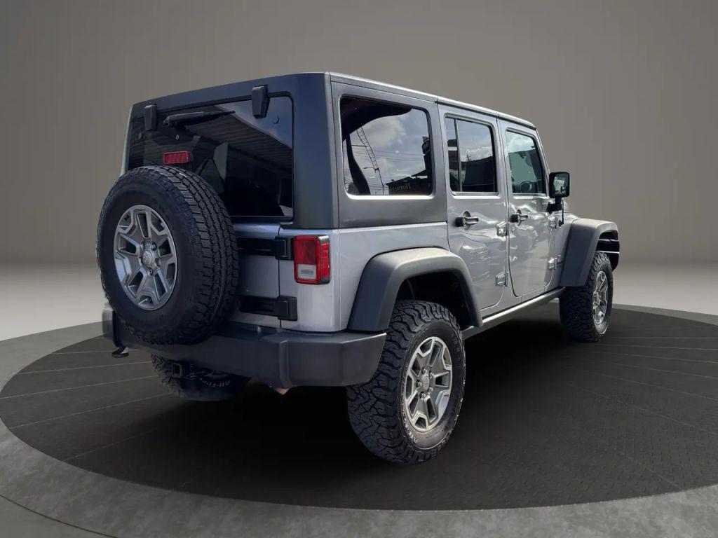 used 2015 Jeep Wrangler Unlimited car, priced at $18,999