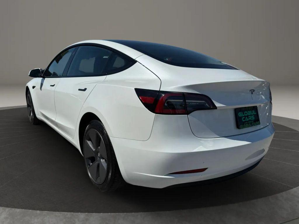 used 2023 Tesla Model 3 car, priced at $26,999