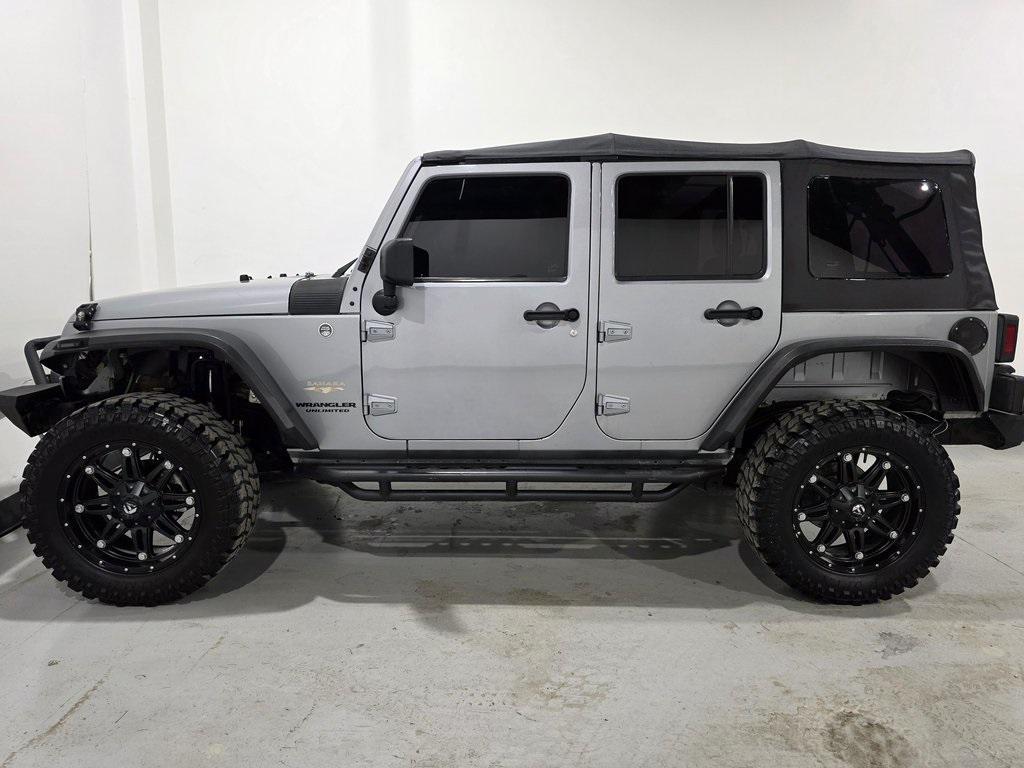 used 2013 Jeep Wrangler Unlimited car, priced at $14,870