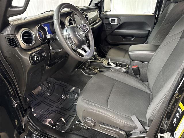 used 2023 Jeep Wrangler car, priced at $29,492