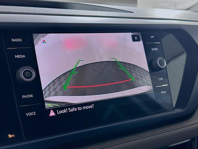 used 2024 Volkswagen Taos car, priced at $18,497