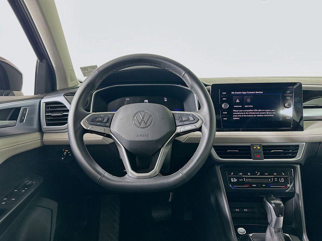 used 2025 Volkswagen Taos car, priced at $22,222