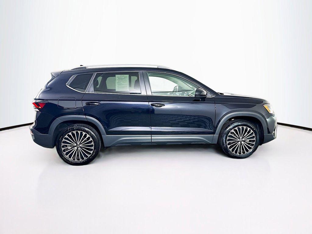 used 2025 Volkswagen Taos car, priced at $22,222