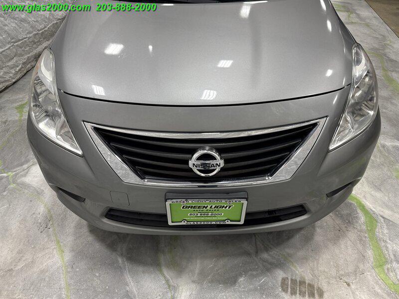 used 2012 Nissan Versa car, priced at $5,999