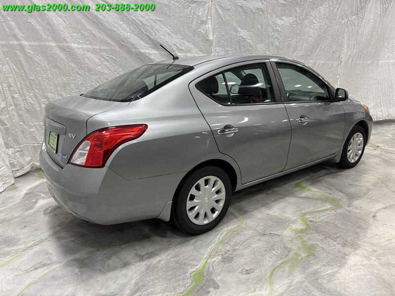 used 2012 Nissan Versa car, priced at $5,999
