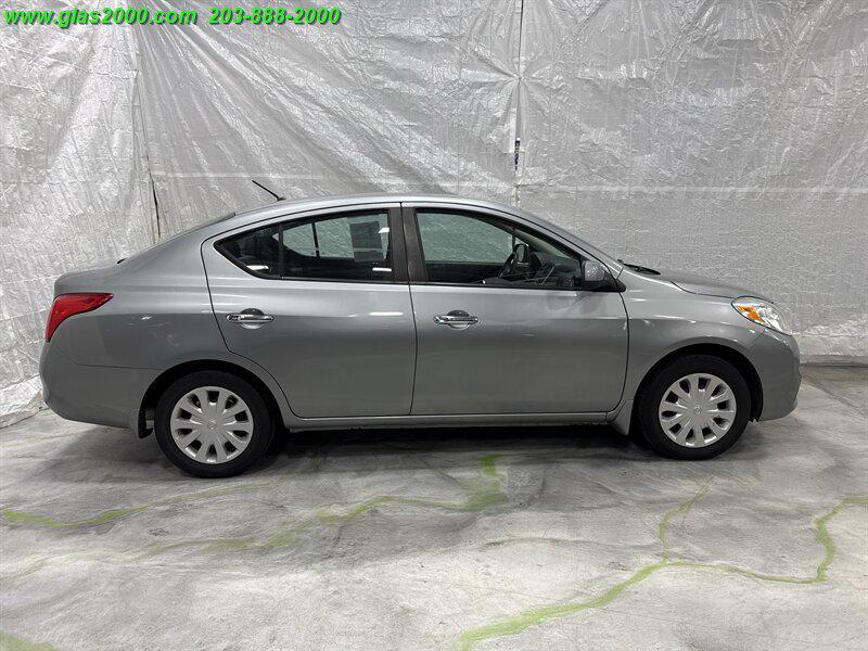 used 2012 Nissan Versa car, priced at $5,999