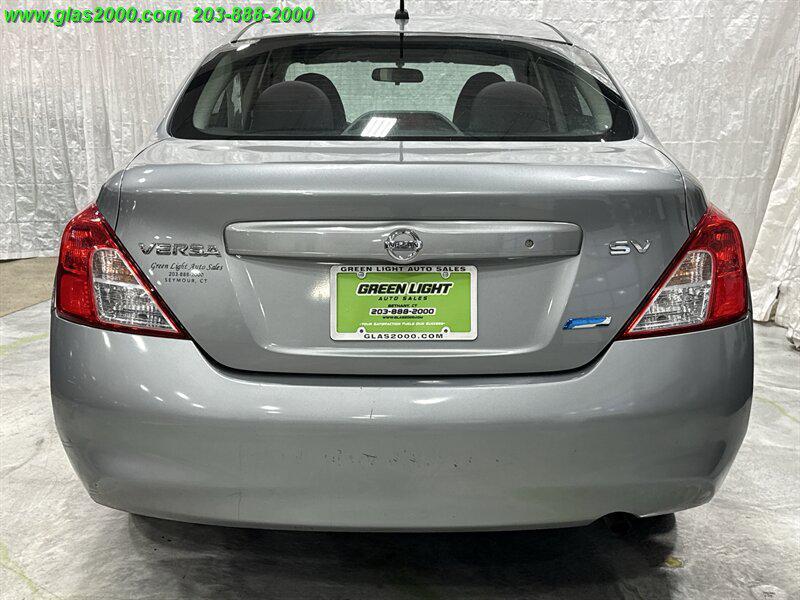 used 2012 Nissan Versa car, priced at $5,999