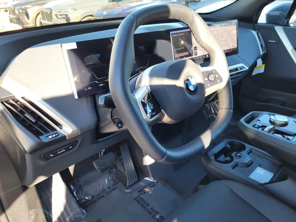 new 2026 BMW iX car, priced at $96,820