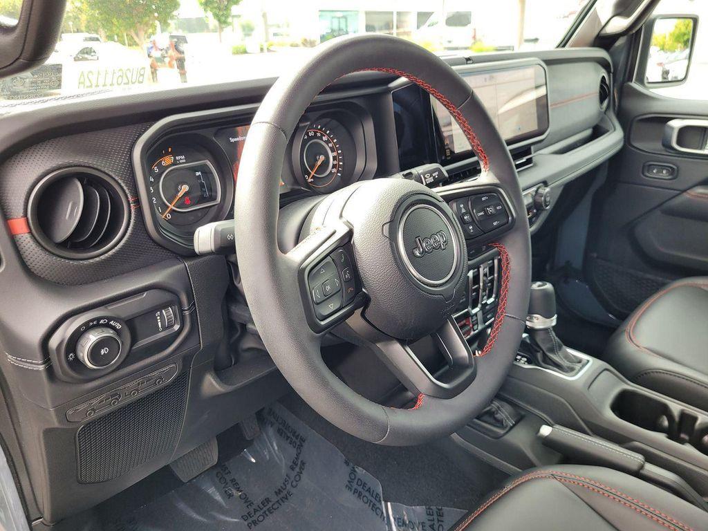 used 2024 Jeep Wrangler car, priced at $47,073