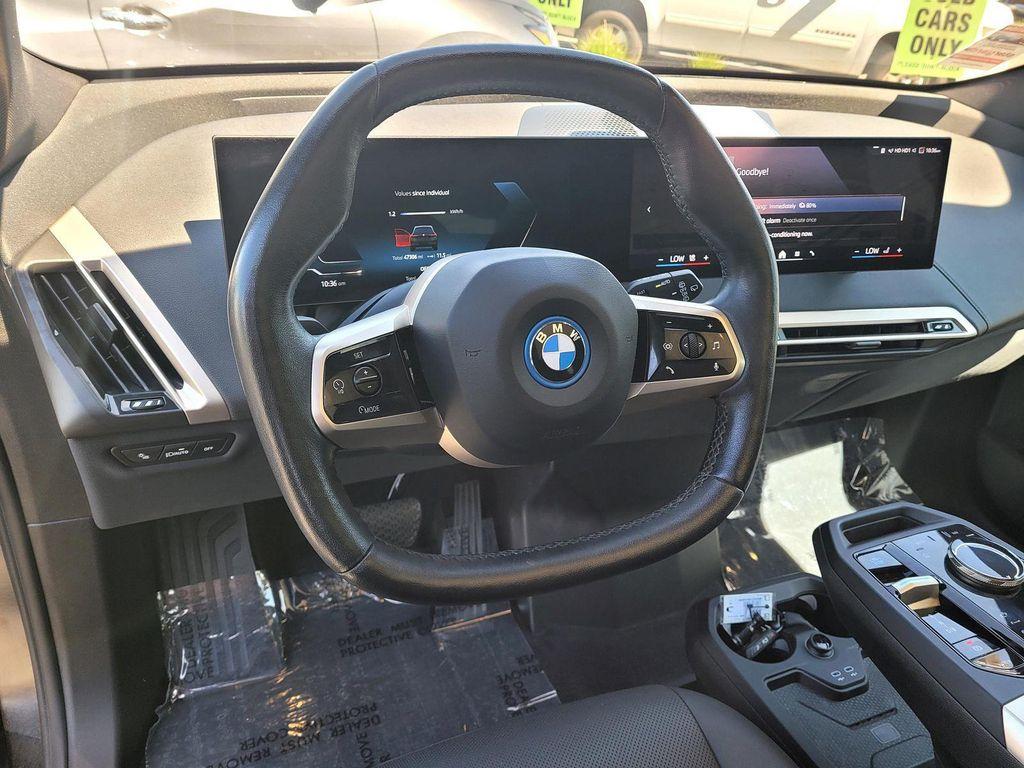 used 2024 BMW iX car, priced at $49,973
