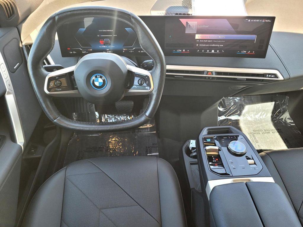 used 2024 BMW iX car, priced at $49,973