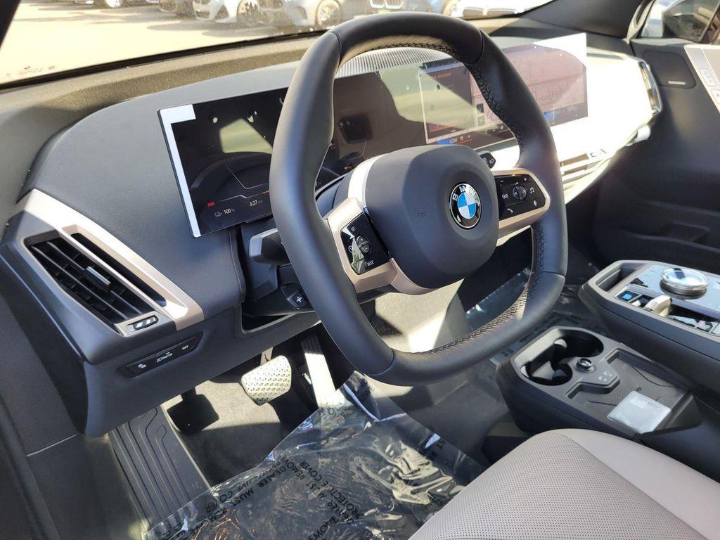 new 2026 BMW iX car, priced at $93,045