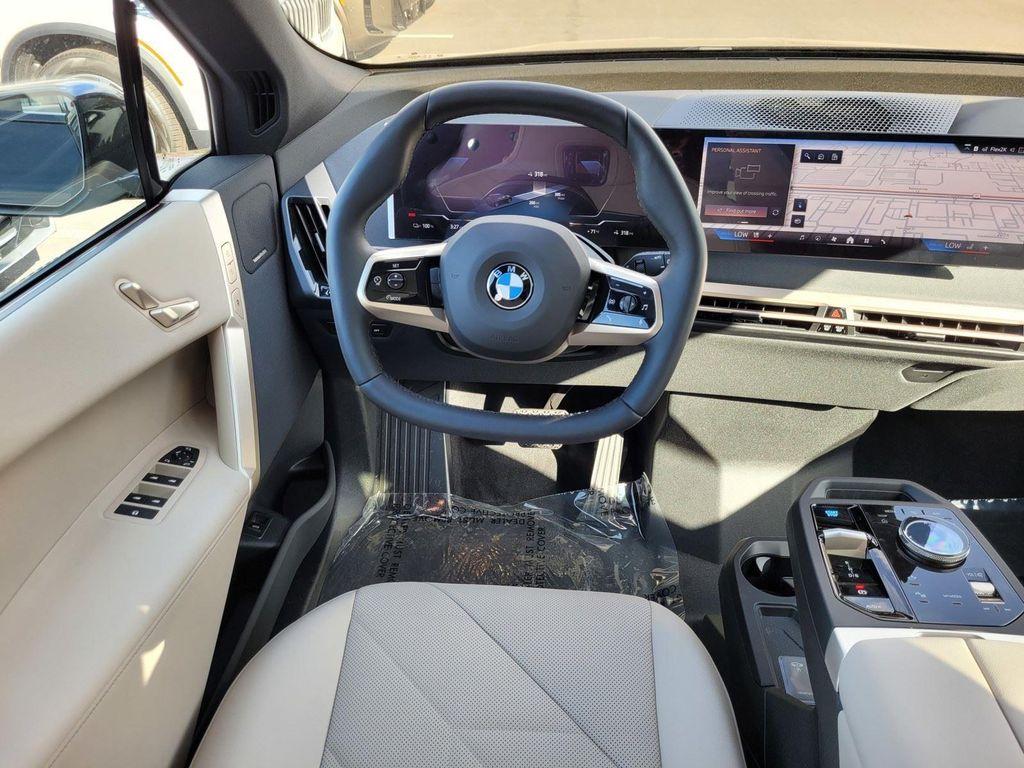 new 2026 BMW iX car, priced at $93,045