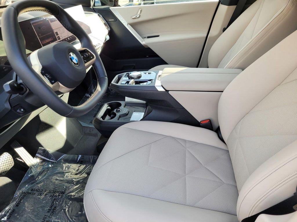 new 2026 BMW iX car, priced at $93,045