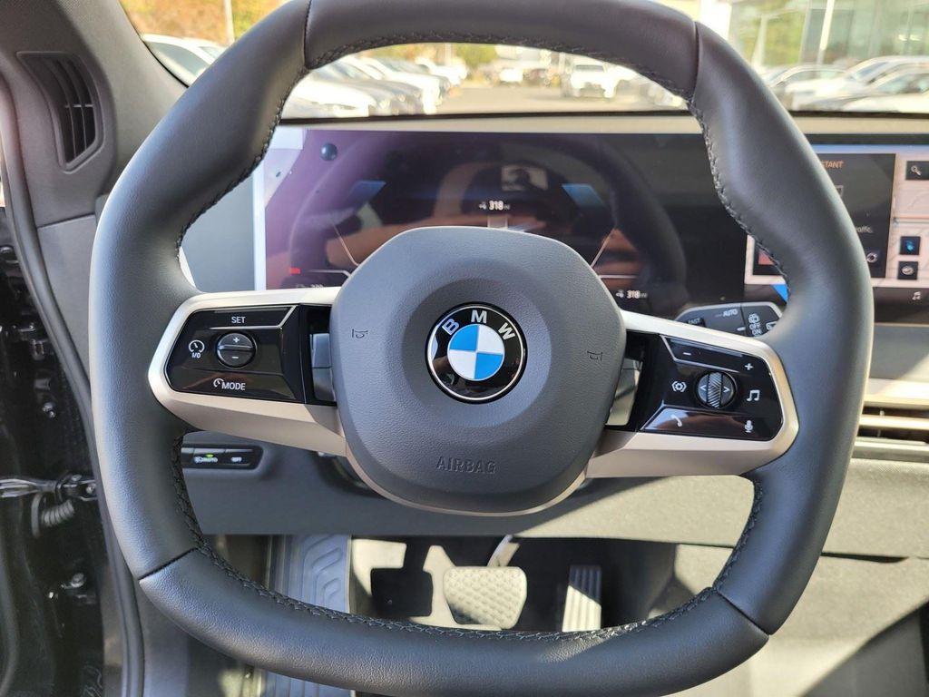 new 2026 BMW iX car, priced at $93,045