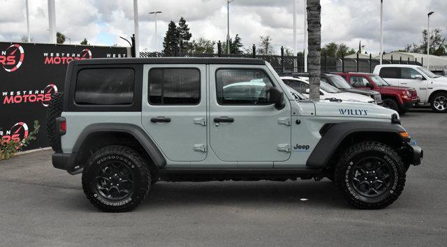 used 2023 Jeep Wrangler 4xe car, priced at $25,940
