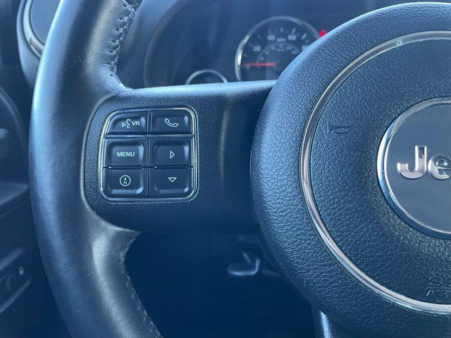 used 2015 Jeep Wrangler Unlimited car, priced at $15,994