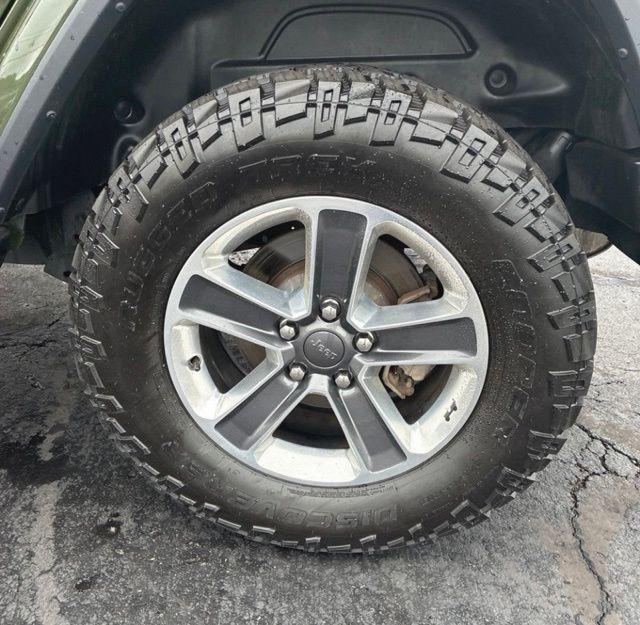used 2021 Jeep Wrangler Unlimited car, priced at $31,774