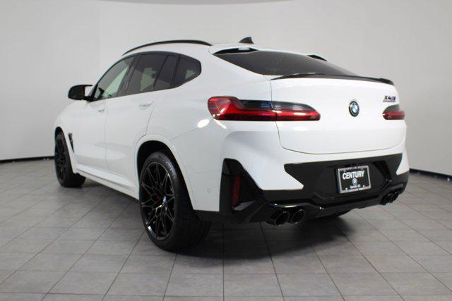new 2025 BMW X4 M car, priced at $97,930