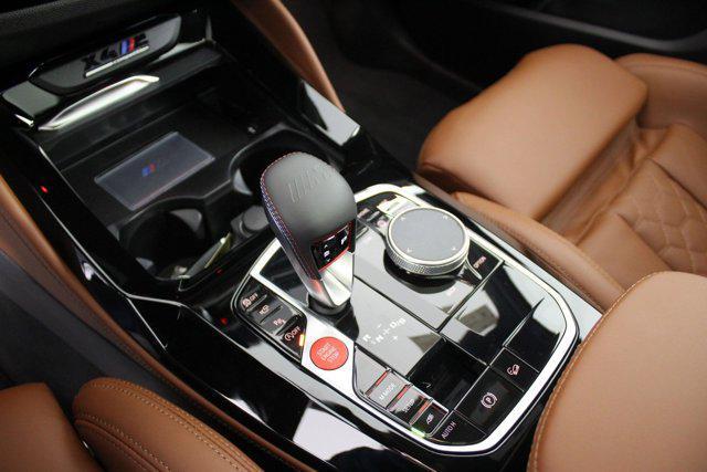 new 2025 BMW X4 M car, priced at $97,930