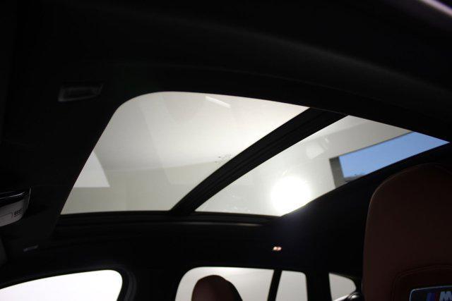 new 2025 BMW X4 M car, priced at $97,930