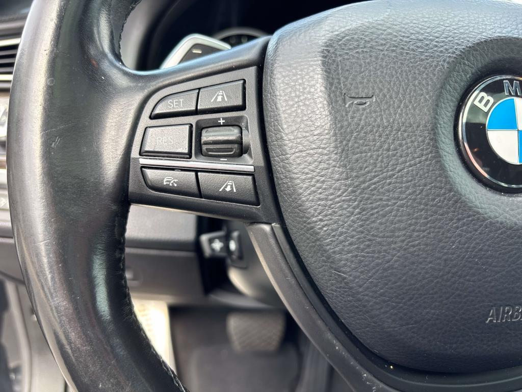 used 2015 BMW 750 car, priced at $16,450