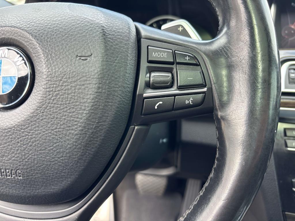 used 2015 BMW 750 car, priced at $16,450