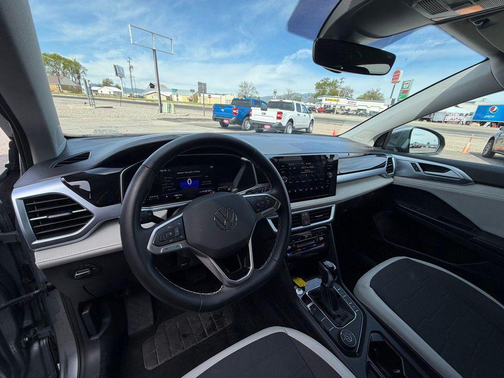 used 2025 Volkswagen Taos car, priced at $24,500